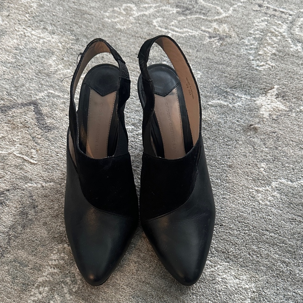 10 Crosby Derek Lam Black Leather and Suede Pointed Slingback Pumps